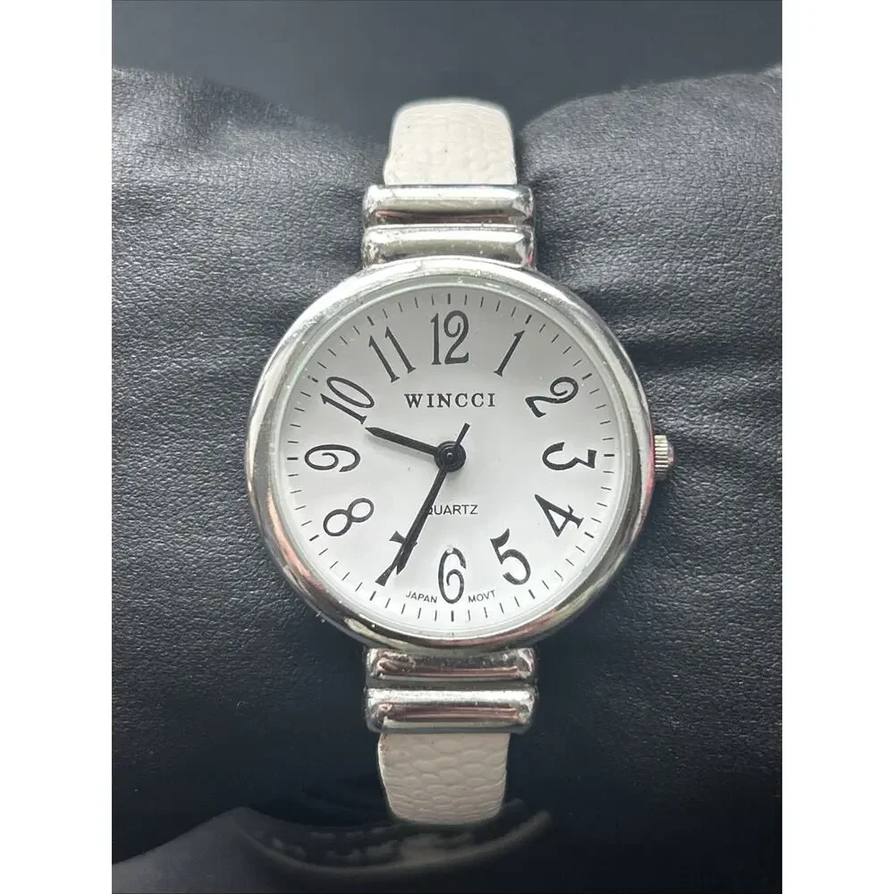 Wincci Silver Tone White Dial And Band Women’s Cuff Watch